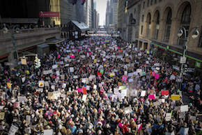 Protestors walk down 42nd Street near Grand Central Terminal during the Women's March in New York City at Dag Hammarskjold Plaza. NYTMARCH NYTCREDIT: Nicole Craine for The New York Times